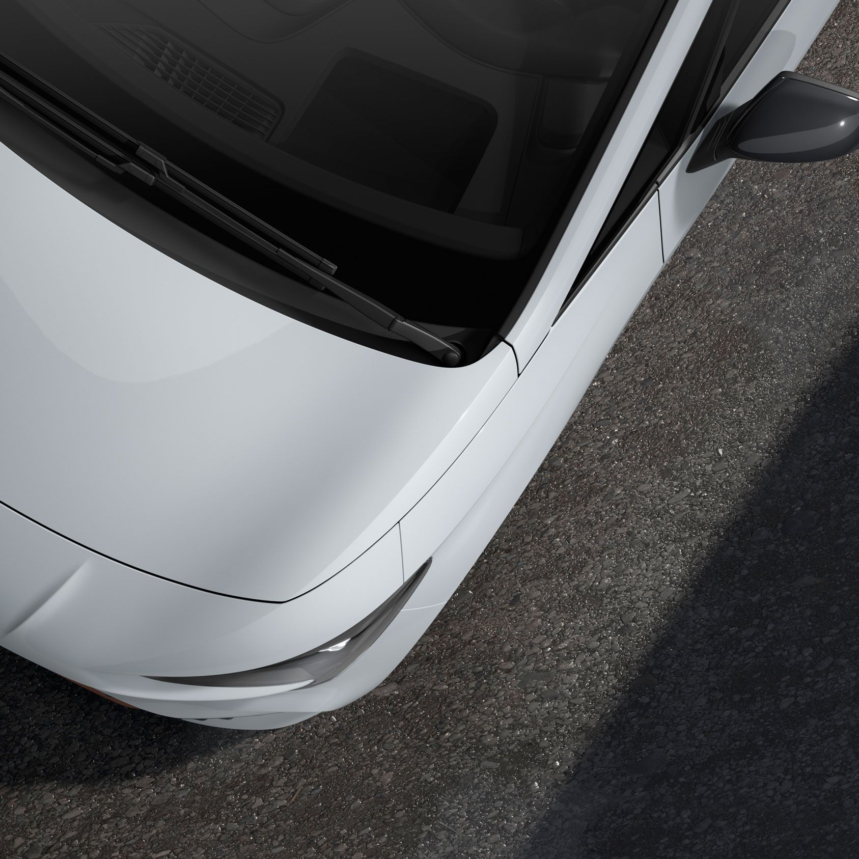 Detailný pohľad na model CUPRA Born v bielom odtieni Nevada metalíza.