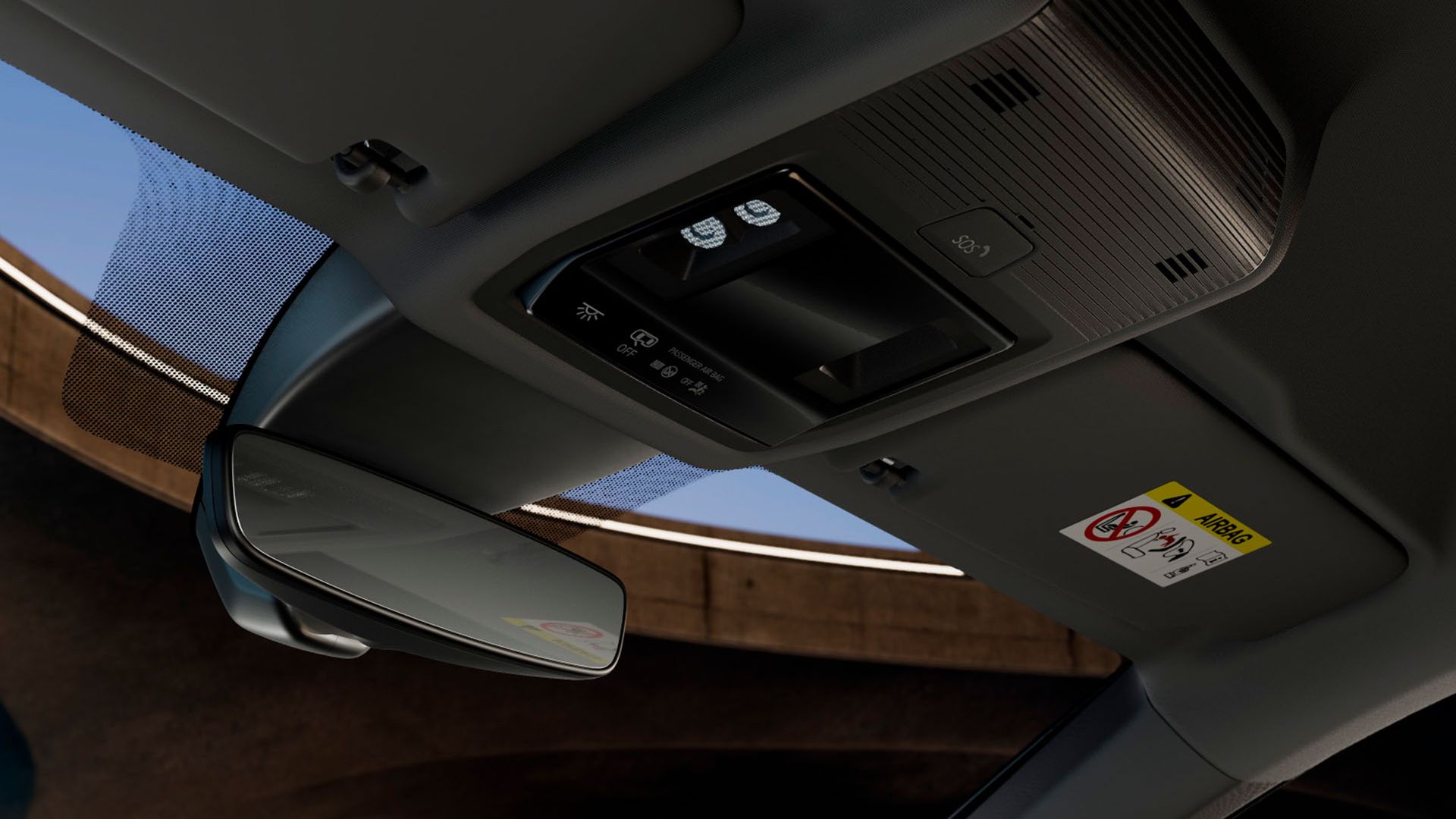 Interiér auta s pohľadom na ovládací panel v strope vozidla obsahujúci ovládacie tlačidlá.