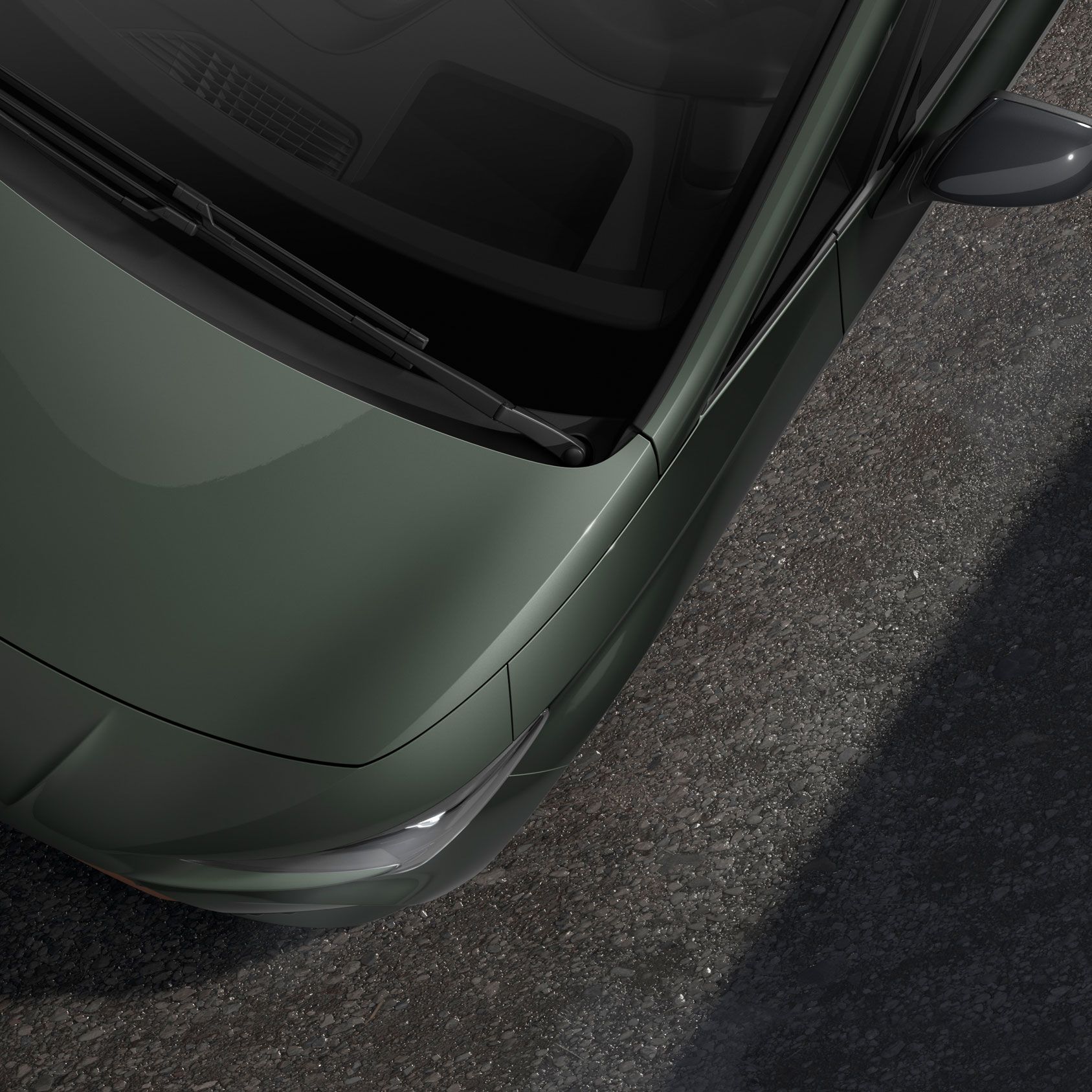 Detailný pohľad na model CUPRA Born v odtieni Dark Forest metalíza.